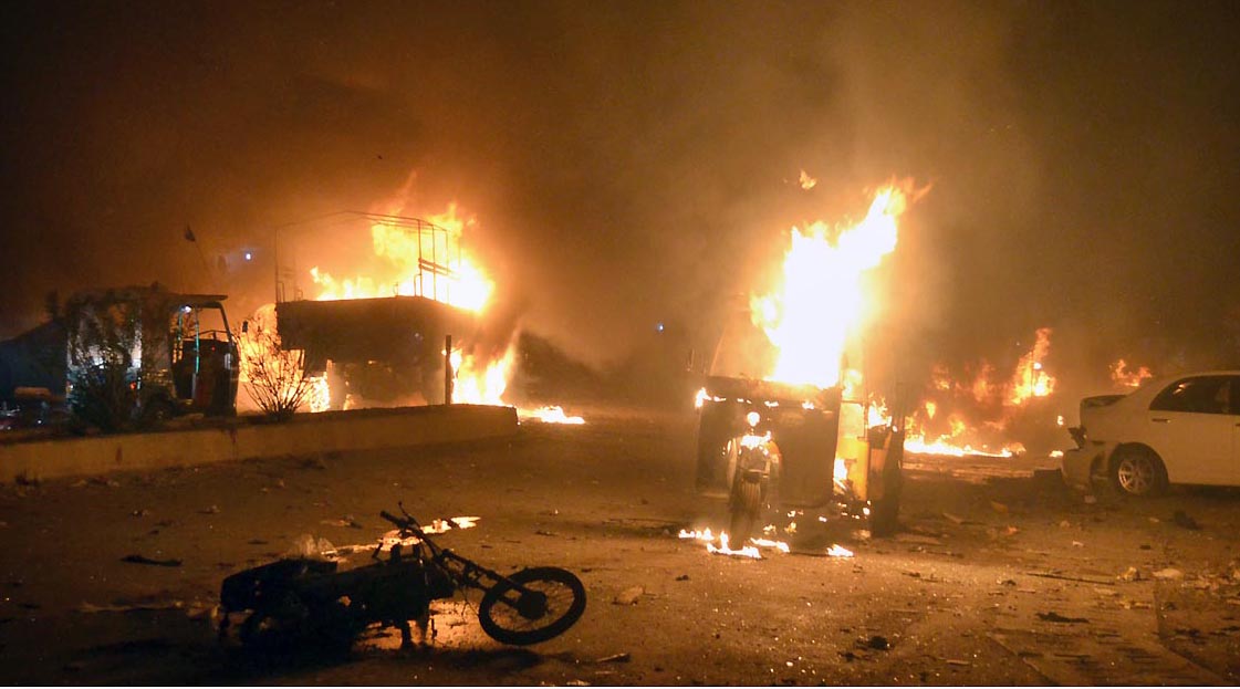 Pic12-116 QUETTA: Aug 12 Blaze at the site of powerful bomb went off near an army truck. At least 15 people, including eight security personnel, were killed and scores were wounded when a powerful bomb went off near an army truck in near Mehdi Hospital at Pishin Stop. The death toll is feared to go up as some of those injured are said to be in critical condition. ONLINE PHOTO by Ahmed Kakar